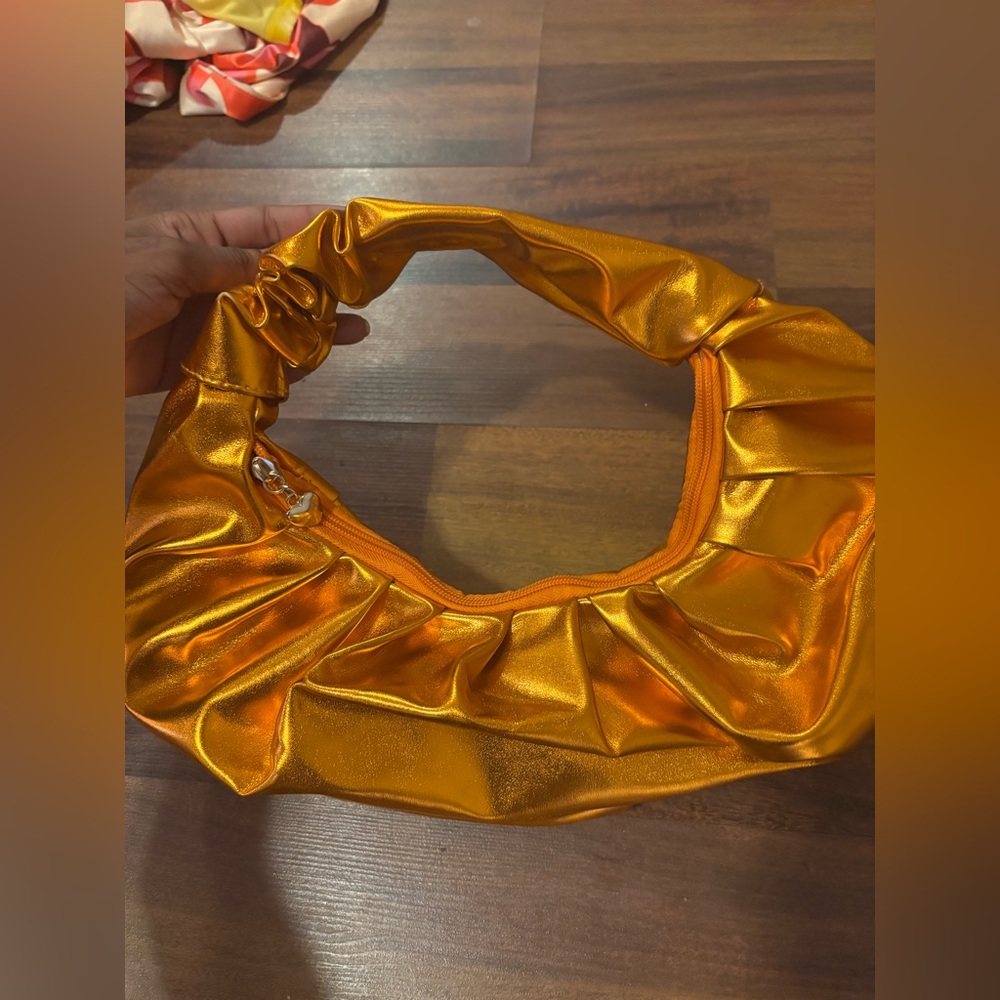 Orange metallic bag